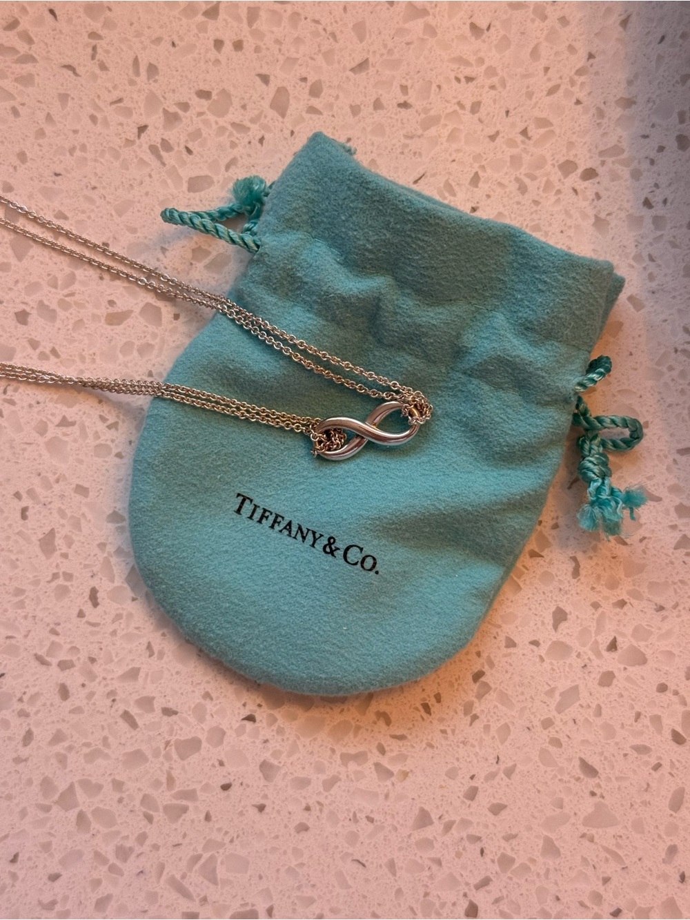 Tiffany & Co. Silver Infinity Necklace with Signature Blue Pouch